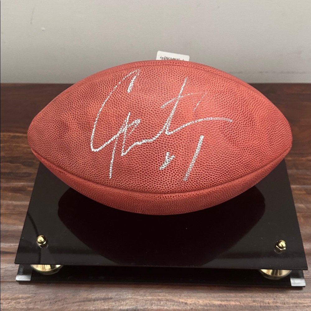 Autographed Cam Newton Football in Display Case